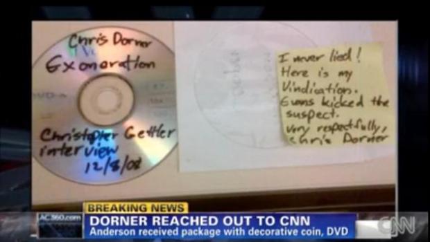 Package sent to Anderson Cooper on February 1, 2013. A DVD with a message, and bulleted coin.